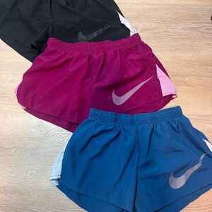 Bundle of Nike Women's Dri-Fit Athletic Shorts - Black, Maroon, and Blue